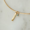 2026 Grad Layering Bar shown on Neck Collar with Blue Topaz Gemstone in gold