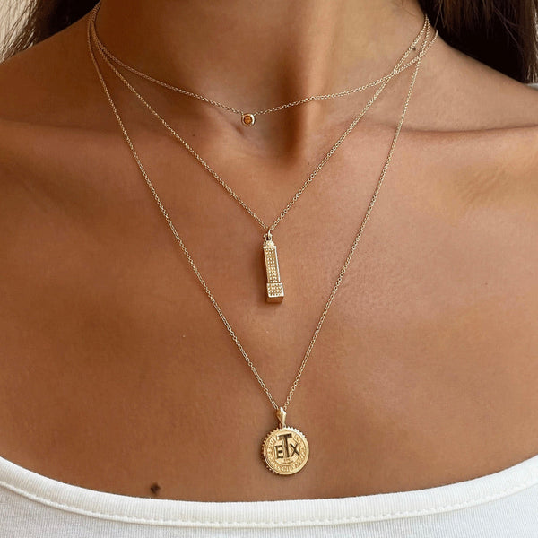 UT Tower Pendant on figure
