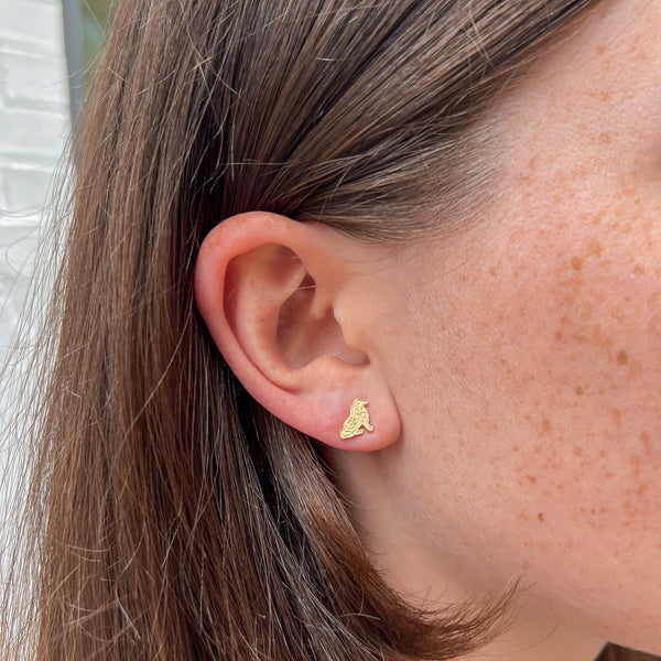 Texas A&M Reveille Stud Earring shown on figure in gold