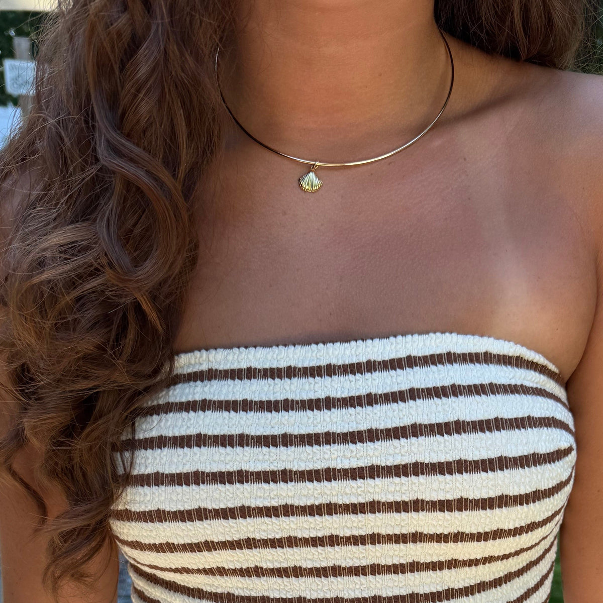 Neck Collar shown on figure in gold with Seashell Charm