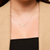 Alpha Chi Omega Horizontal Bar Necklace shown on figure in gold