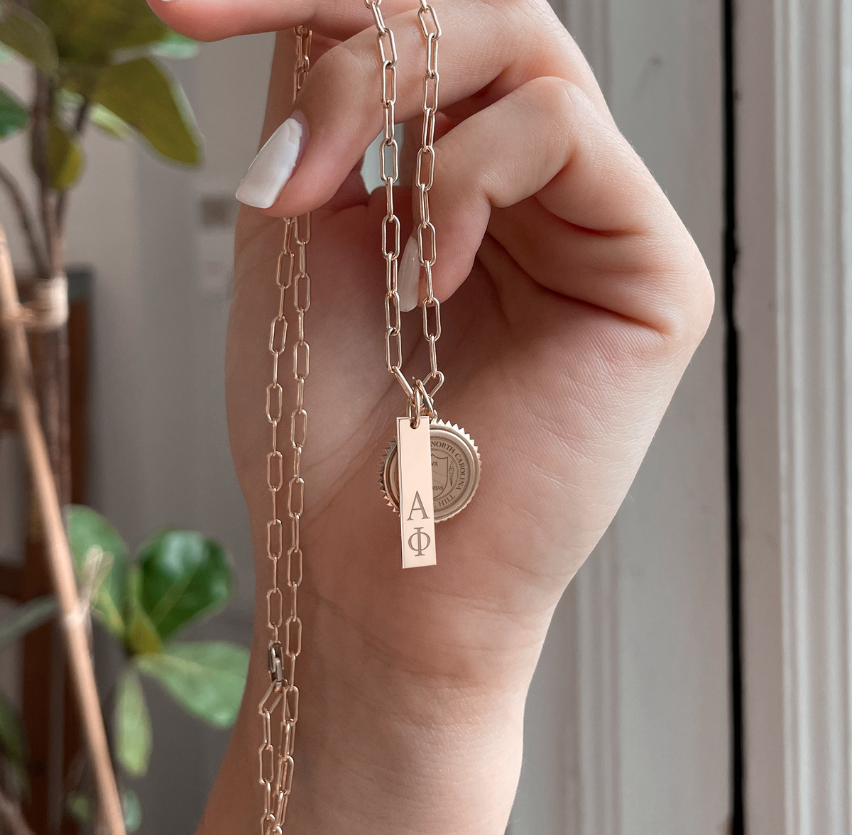 Alpha Chi Omega Vertical Bar shown in gold with Link Chain