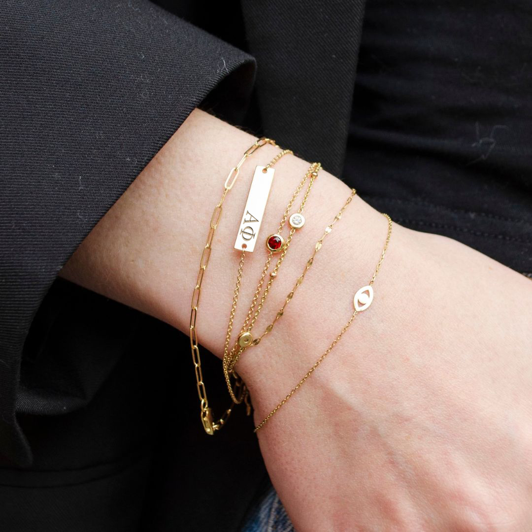 Alpha Phi Bracelet shown on figure