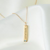 Spelman Blue Topaz Gemstone Bar laydown shown in gold