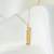 Spelman Blue Topaz Gemstone Bar laydown shown in gold