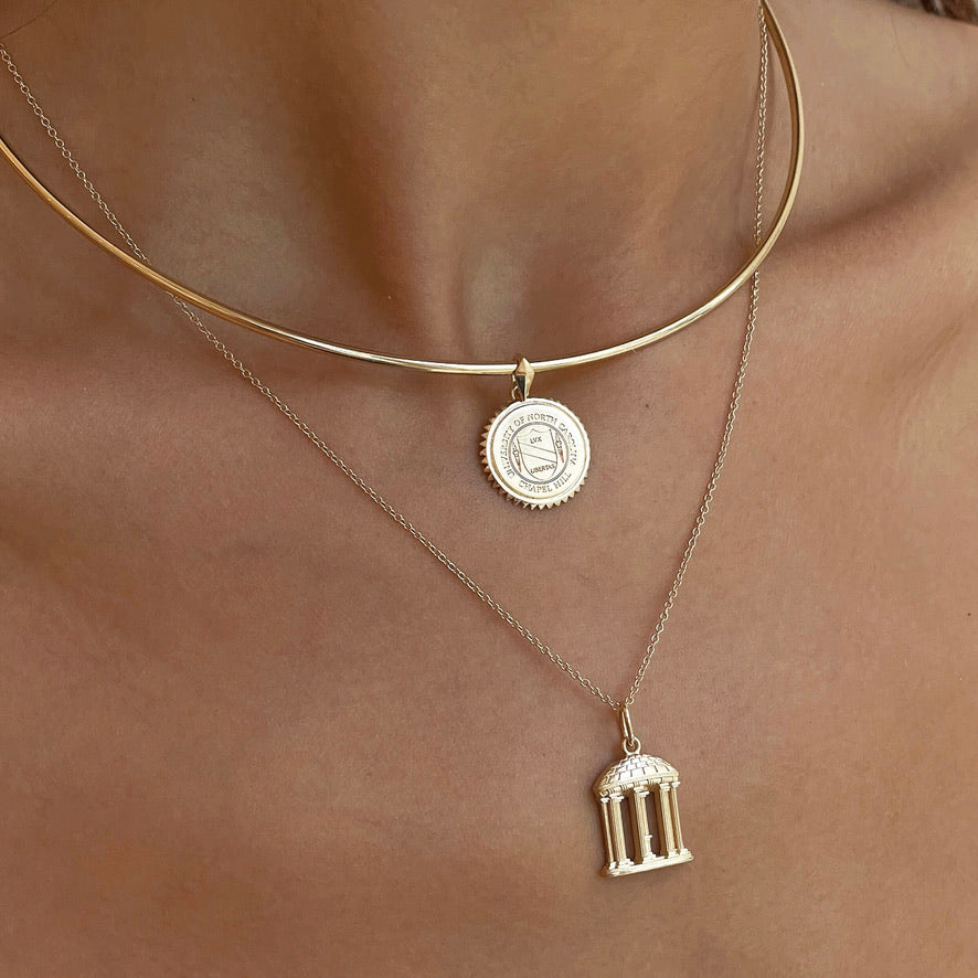 UNC Old Well Pendant on figure