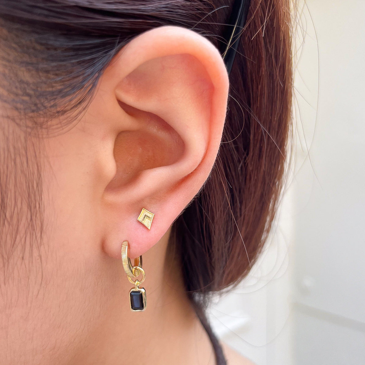 Kappa Alpha Theta Kite Florentine Earring Bundle shown on figure in gold