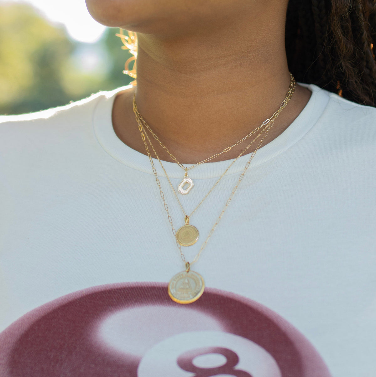 Ohio State Logo Charm shown on figure in gold on Link Chain with Ohio State Sunburst and Ohio State Florentine Necklace