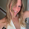 U Miami Charm Bundle shown on figure in gold with U Miami Sunburst Pendant on Cable Chain