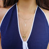 Vanderbilt Sunburst Pendant shown on figure in gold on Link Chain with Kappa Kappa Gamma Key Charm in gold on Cable Chain