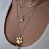 Clemson Paw Charms in both sizes shown on figure in gold with Neck Collar in gold