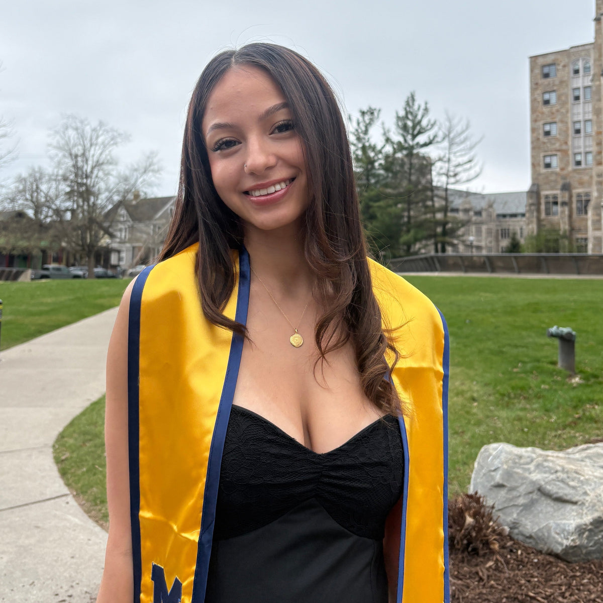 Michigan Sunburst Pendant shown on figure in gold on Cable Chain