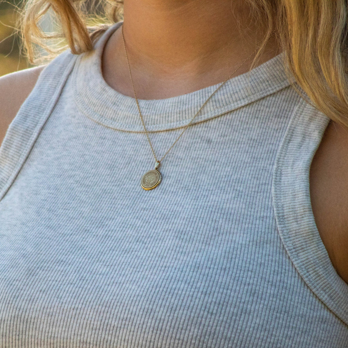 Arizona Seal Sunburst Pendant