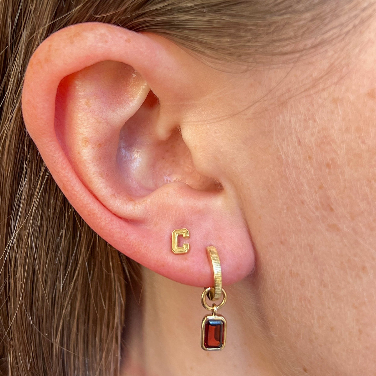 Cornell Florentine Earring Bundle shown on figure in gold