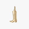 Gold cowboy boot charm on a white background