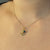 Delta Gamma Anchor Charm Bundle shown on figure in gold