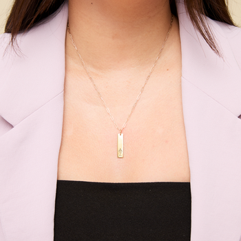 Delta Zeta Vertical Bar shown on figure in gold on Link Chain