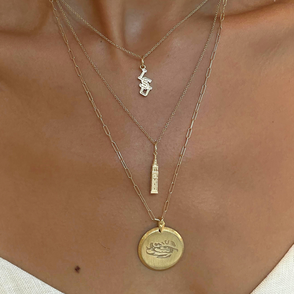 LSU Memorial Tower Pendant on figure