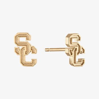 A pair of gold-toned stud earrings shaped like the interlocking letters 'SC', shown from front and side angles on a light gray background.