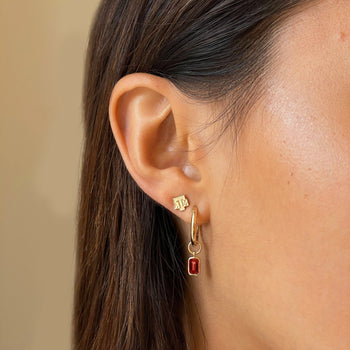 Texas A&M Classic Earring Bundle shown on figure in gold