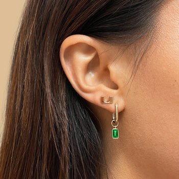 UMiami Logo Mini U Earring Bundle shown on figure in gold