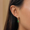 Shamrock Emerald Mini U Earring Bundle shown on figure in gold
