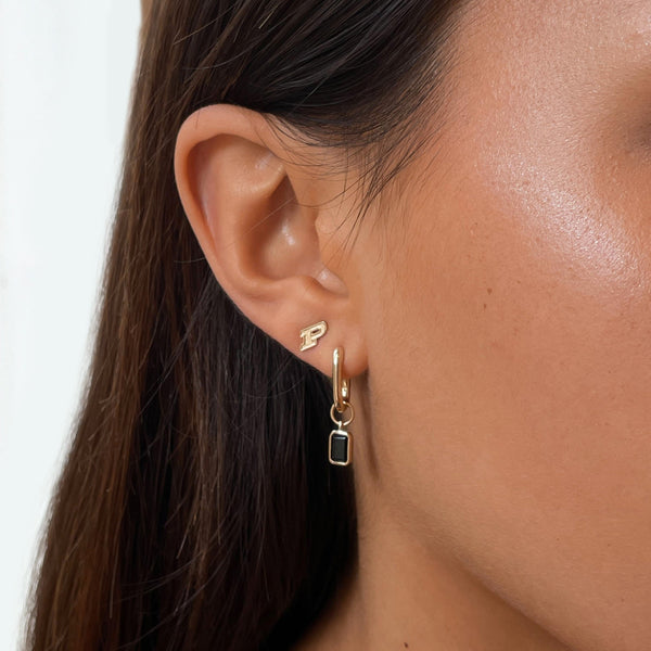 Purdue Mini U Earring Bundle shown on figure in gold
