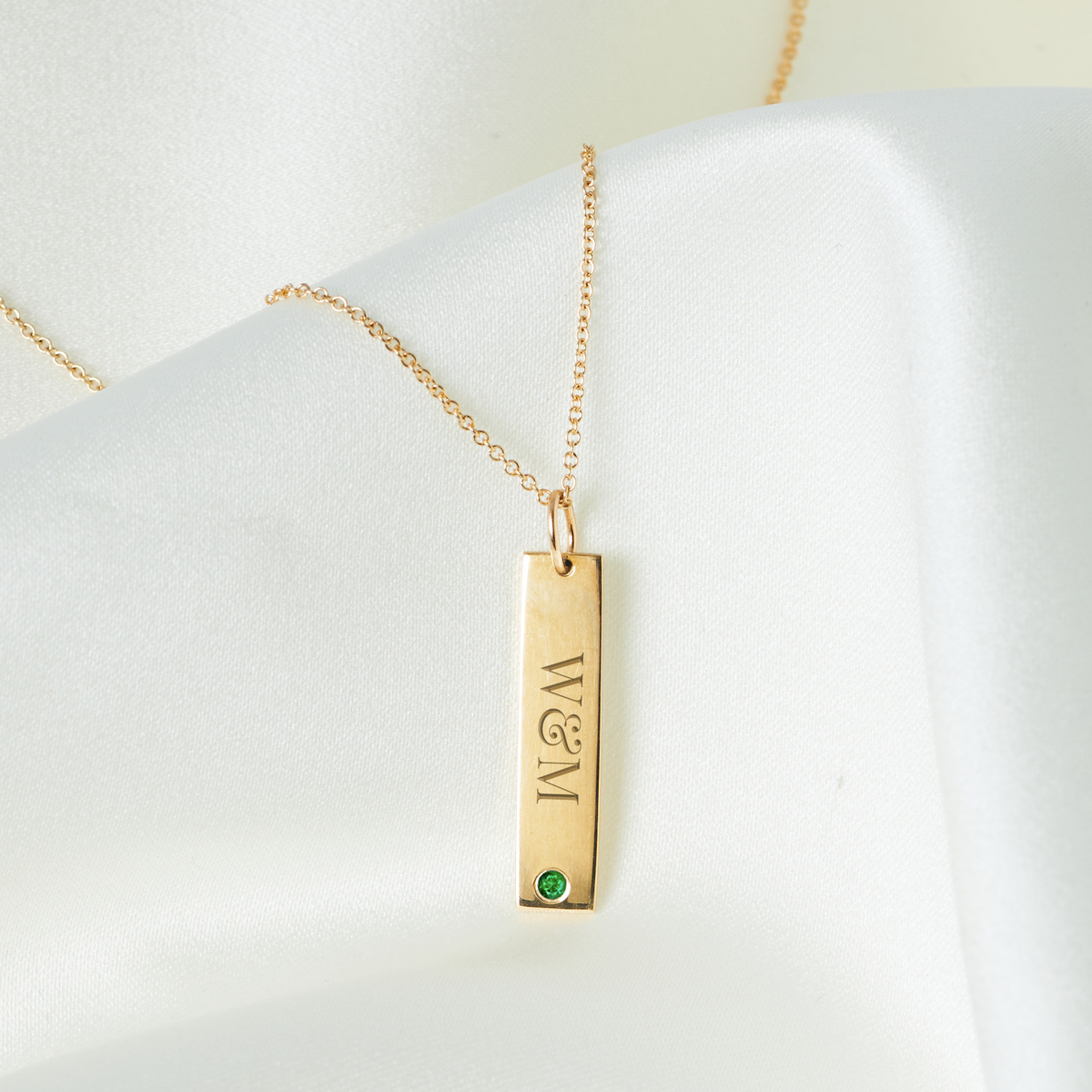 William & Mary Emerald Gemstone Bar laydown shown in gold