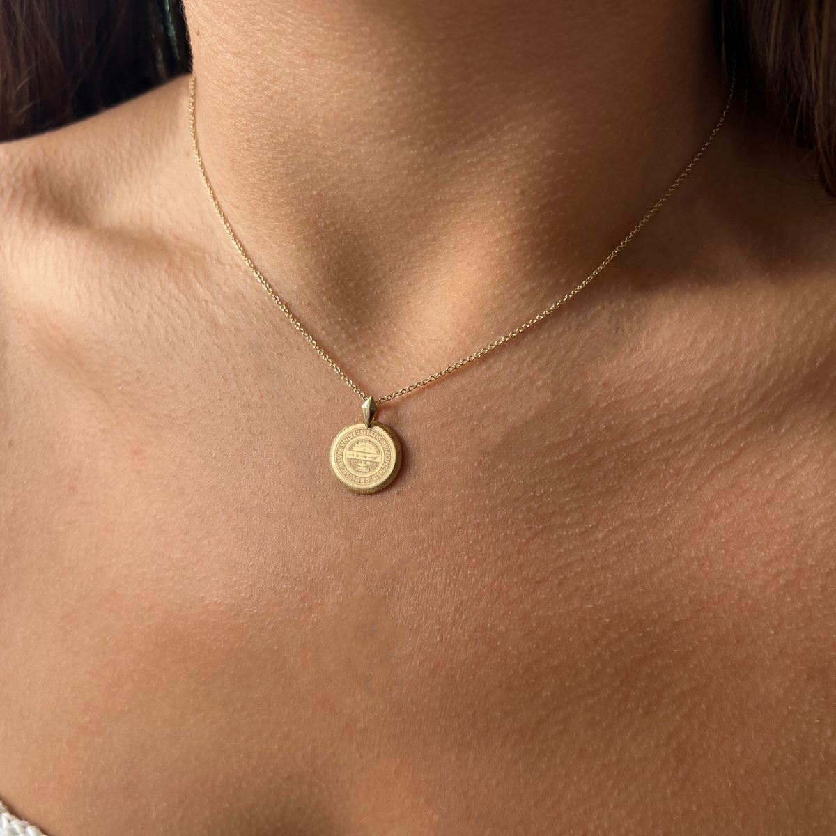 Arizona Florentine Petite shown on figure in gold on Cable Chain