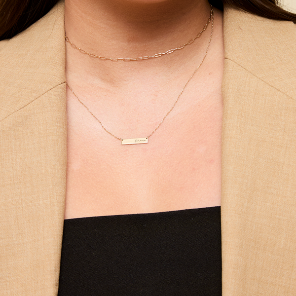 Furman Horizontal Bar Necklace shown on figure in gold