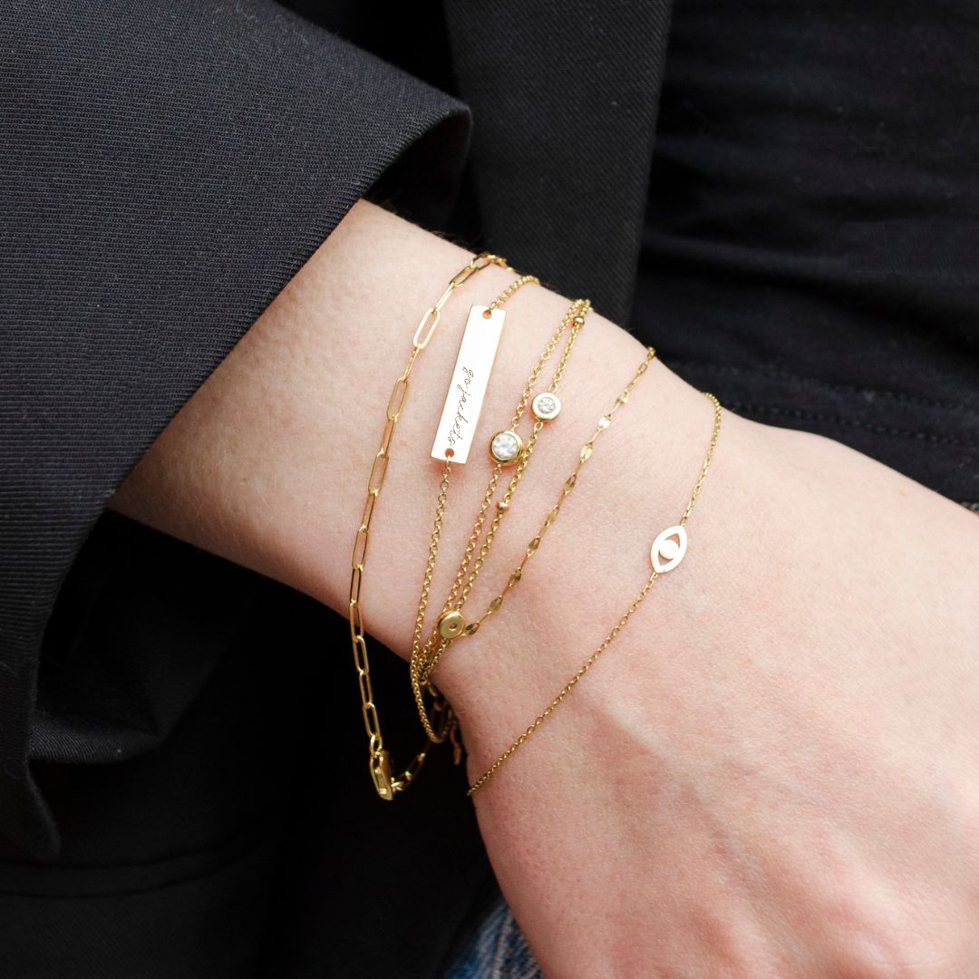 Georgia Tech Go Jackets Bracelet shown on figure in gold with Link Chain Bracelet