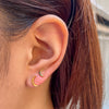 Gamma Phi Beta Moon Stud Earring shown on figure in 2 sizes in gold