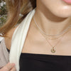 Brown Sunburst Bundle shown on figure in gold