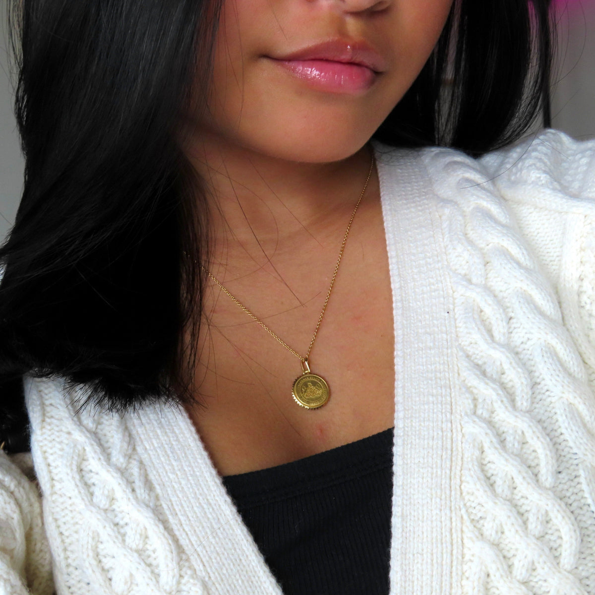 Penn State Sunburst Pendant shown on figure in gold on Cable Chain