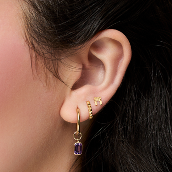 NYU Washington Arch Earrings on figure