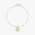 A delicate light blue cord necklace with a gold-toned circular pendant and extension chain, displayed on a clean off-white background.