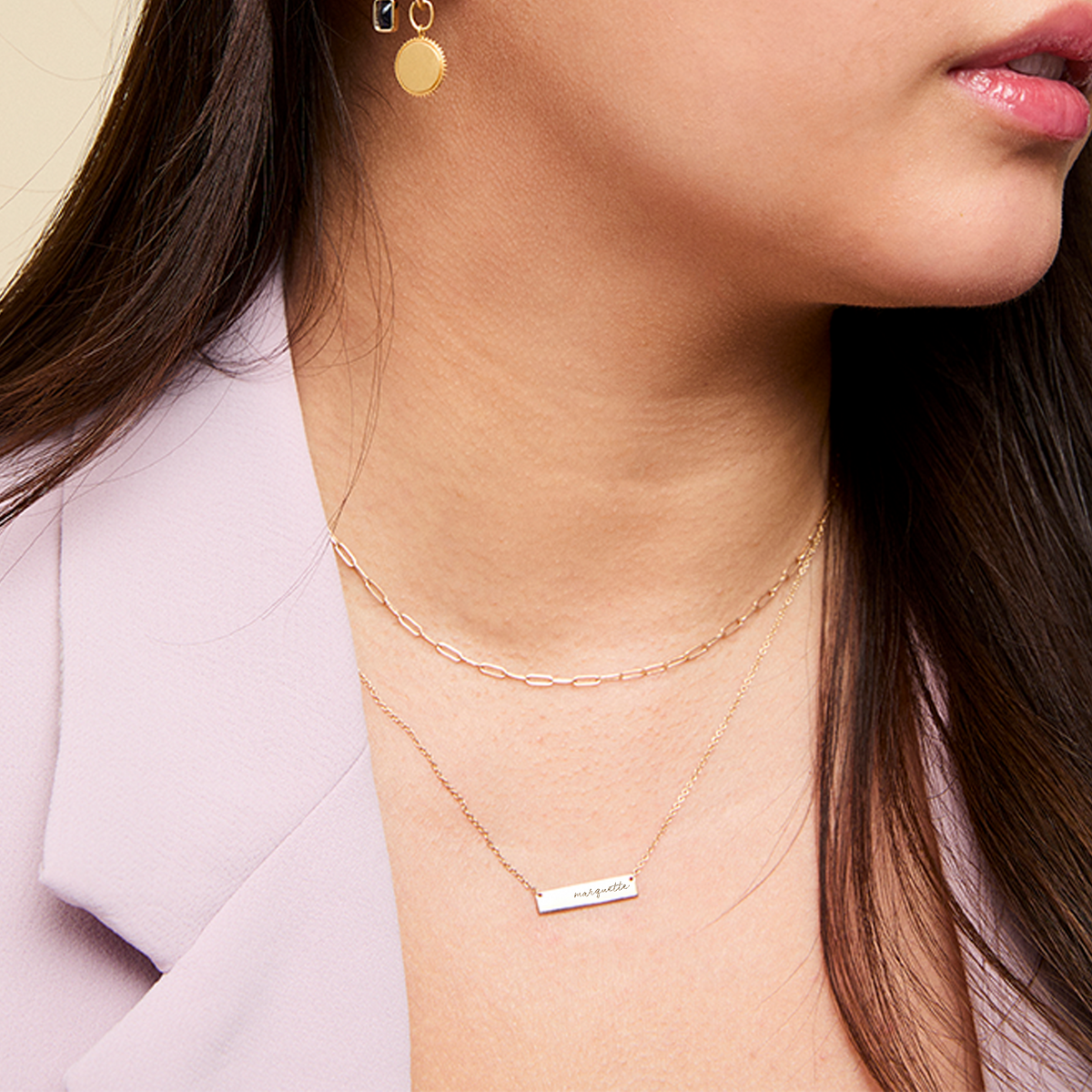 Marquette Bar Necklace shown on figure in gold