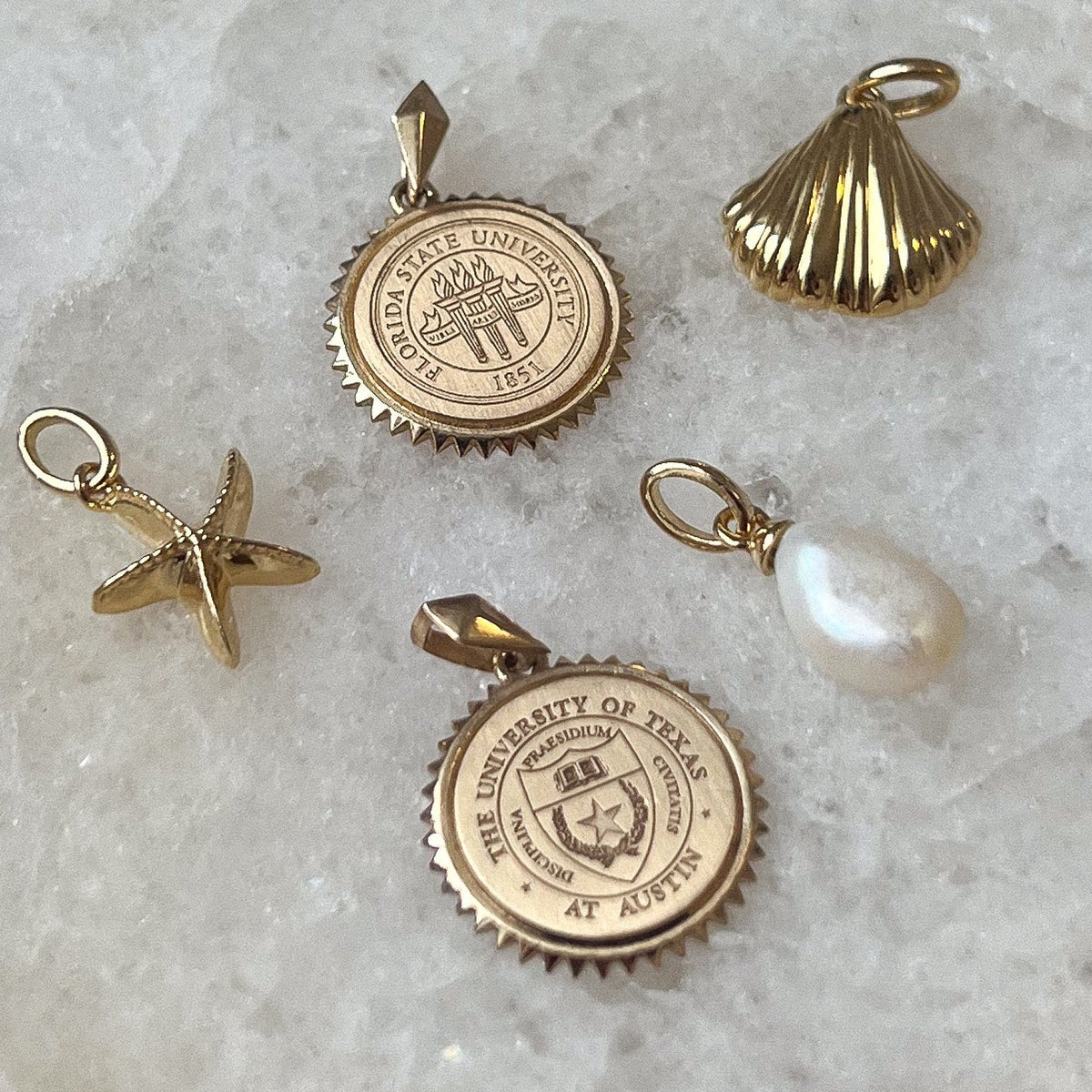 Summer Charms laydown with FSU and Texas Sunburst Pendants