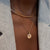 North Star Charm shown on figure in gold with Penn State Sunburst Pendant on Cable Chain with Neck Collar in gold