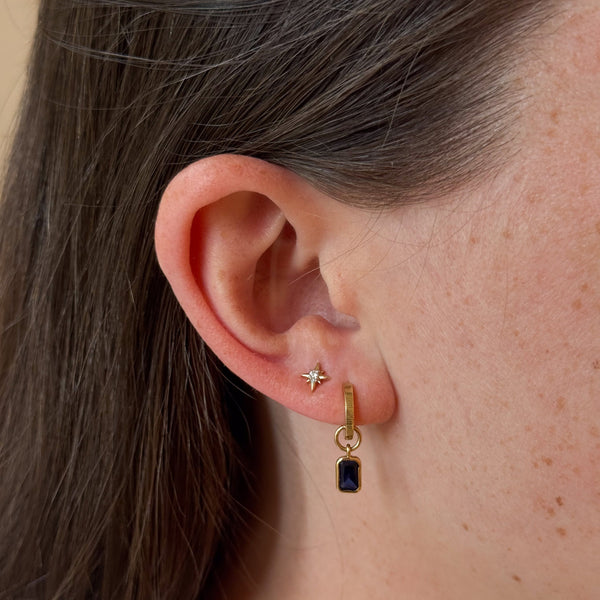 North Star Stud Earring shown on figure in gold with Black Onyx Florentine Earring Bundle