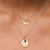 Notre Dame Sunburst Bundle shown on figure in gold with Organic Necklace