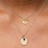 Notre Dame Sunburst Bundle shown on figure in gold with Organic Necklace