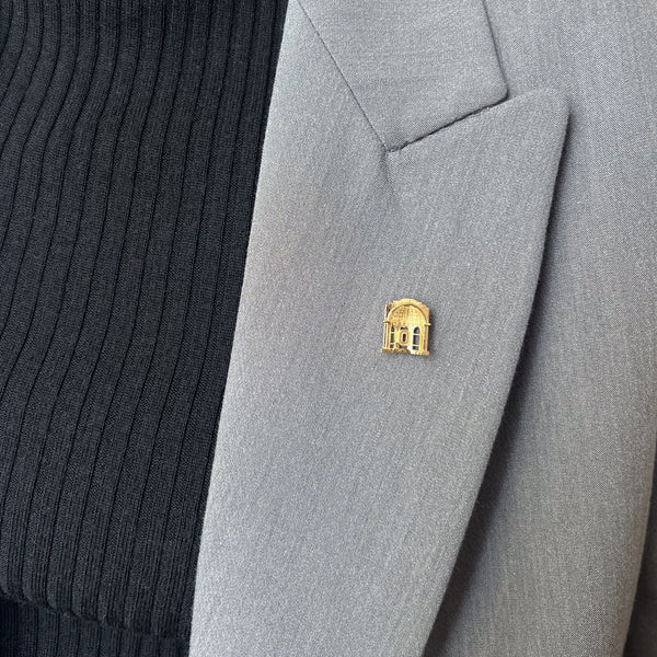 Ohio State Rotunda Lapel Pin shown on figure in gold