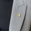 Ohio State Rotunda Lapel Pin shown on figure in gold