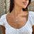Organic Petite Necklace shown on figure in gold with Link Chain Choker