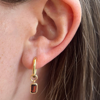 Garnet Mini U Hoop Earring Bundle shown on figure in gold