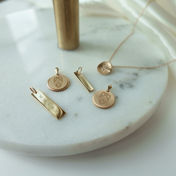 Rice University collection laydown shown in gold