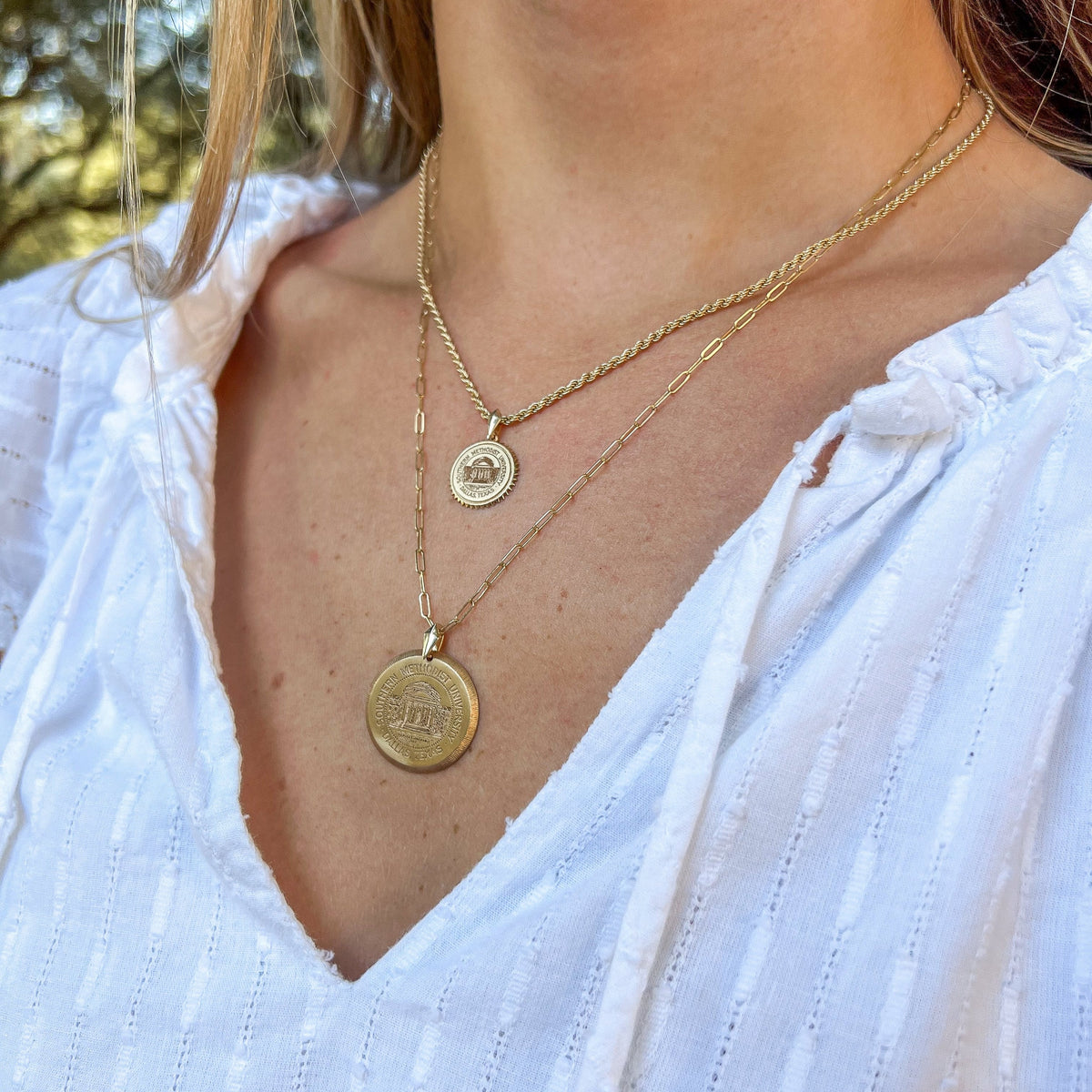 SMU Seal Florentine Necklace shown on figure in gold with Link Chain and SMU Seal Sunburst