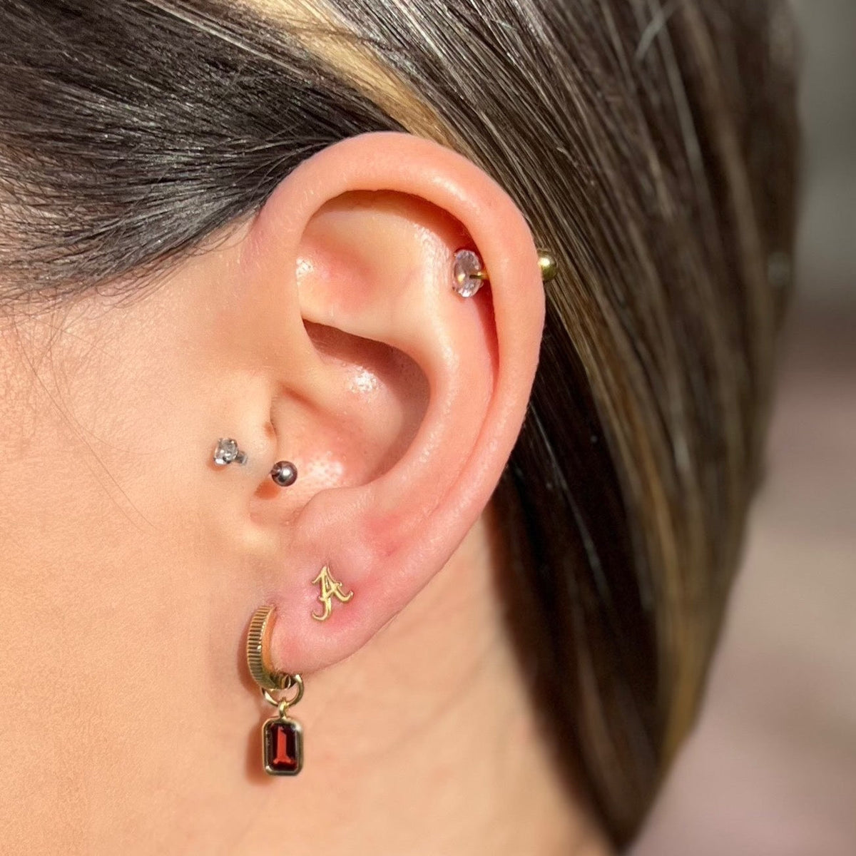 Alabama Florentine Earring Bundle shown on figure in gold