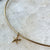 Starfish Charm shown on Neck Collar in gold